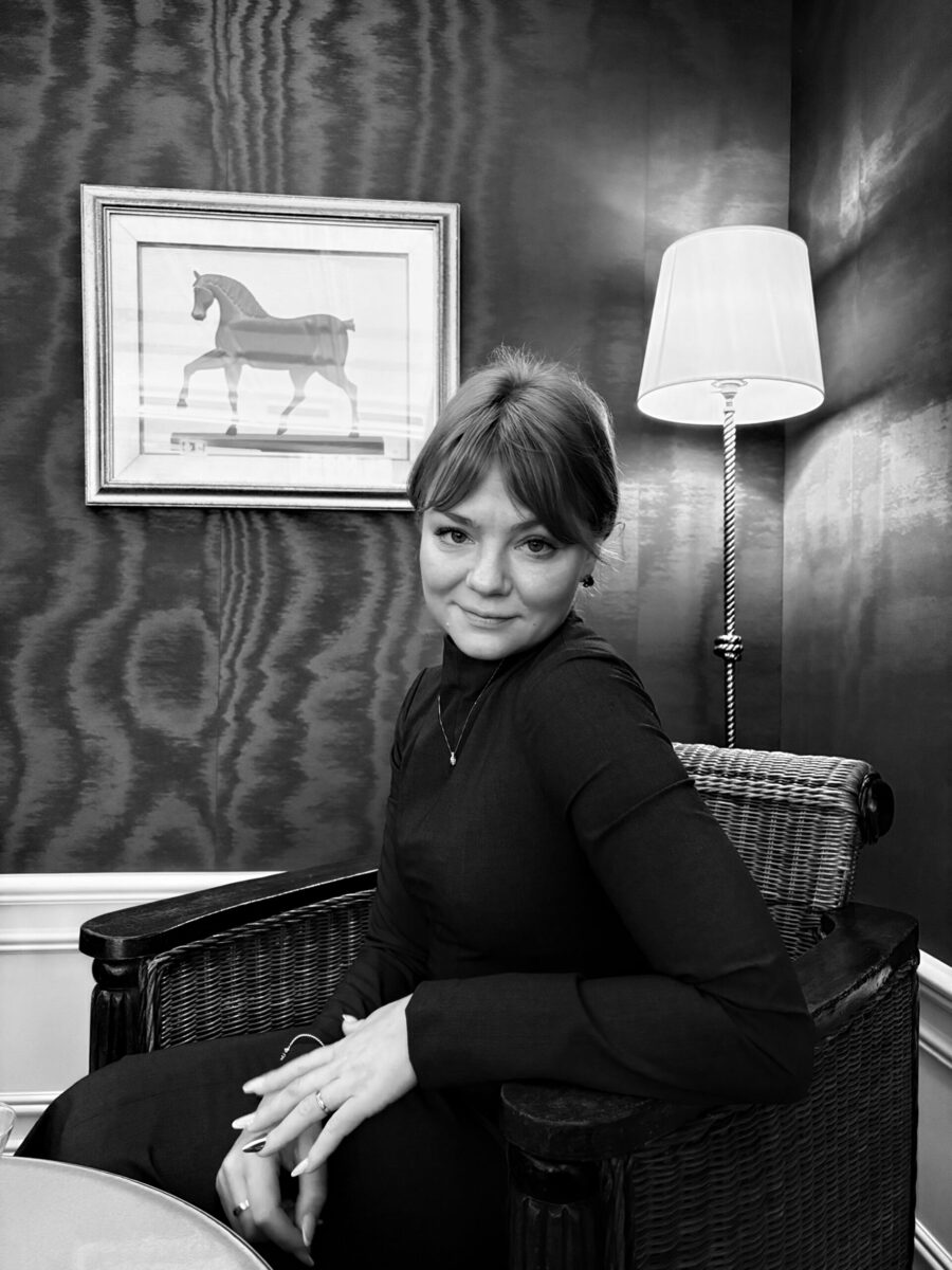 Minna Sundström in an armchair at Studio Nian